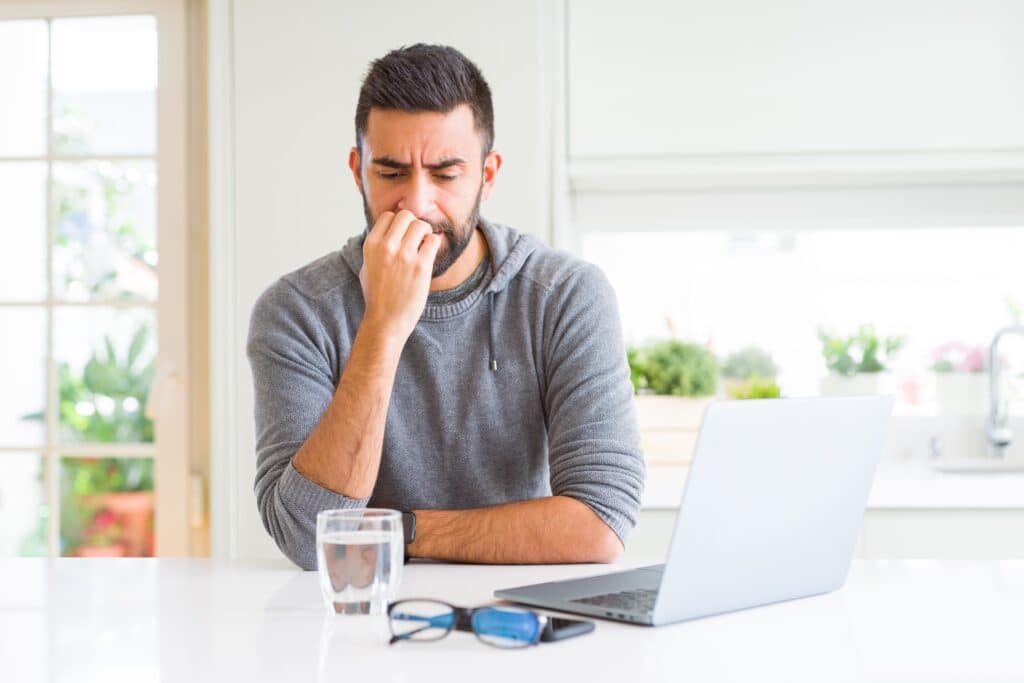 A therapist looks worried and anxious representing “What If I’m Doing It Wrong?” Untangling Therapist Performance Anxiety