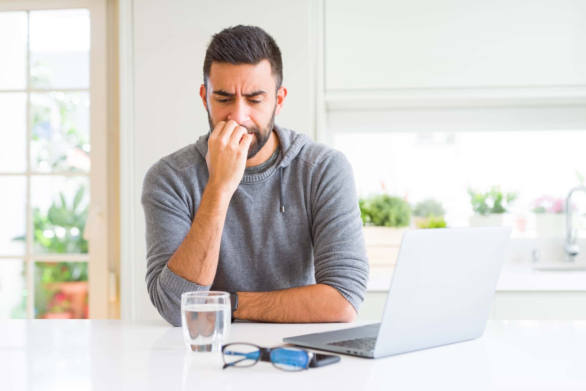 A therapist looks worried and anxious representing “What If I’m Doing It Wrong?” Untangling Therapist Performance Anxiety