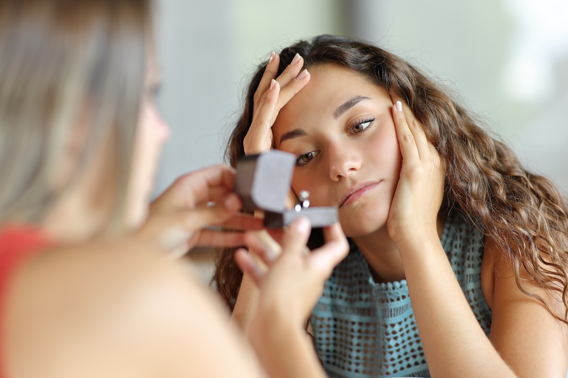 Woman feeling left behind as friend shows engagement ring