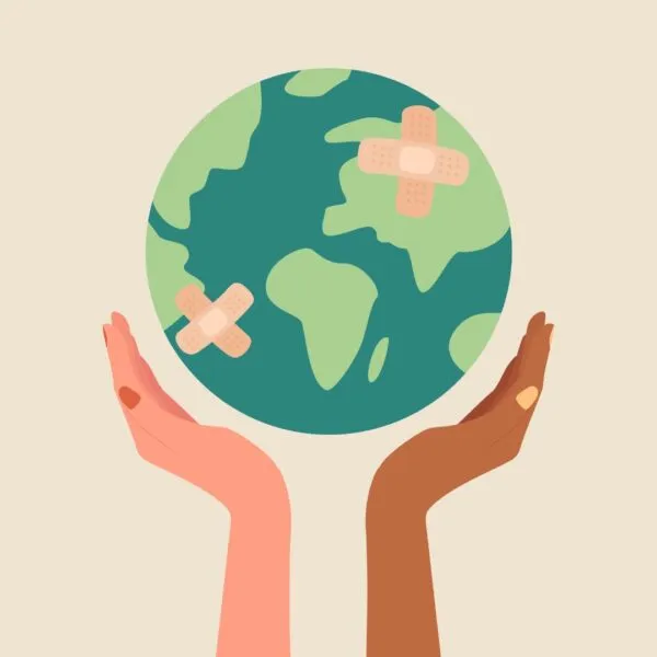 Two hands of different skin tones holding up the Earth with bandages, symbolizing healing political communication and bridging differing values and beliefs.